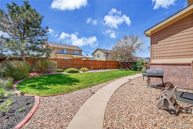 view of yard featuring a fenced backyard