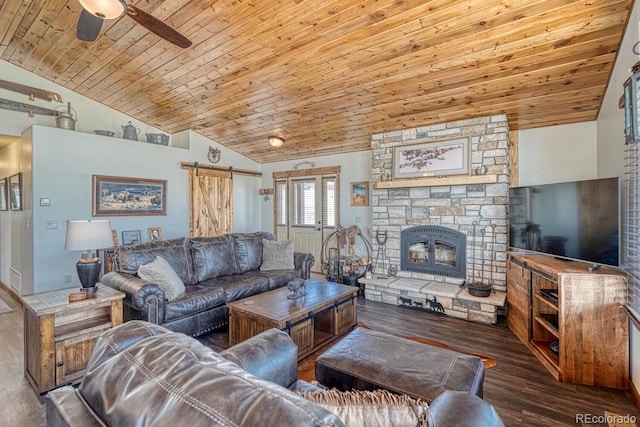 7103 Ranch Rd, Hartsel, CO 80449 - living room with vaulted ceiling, wood ceiling, a ceiling fan, wood finished floors, and a barn door