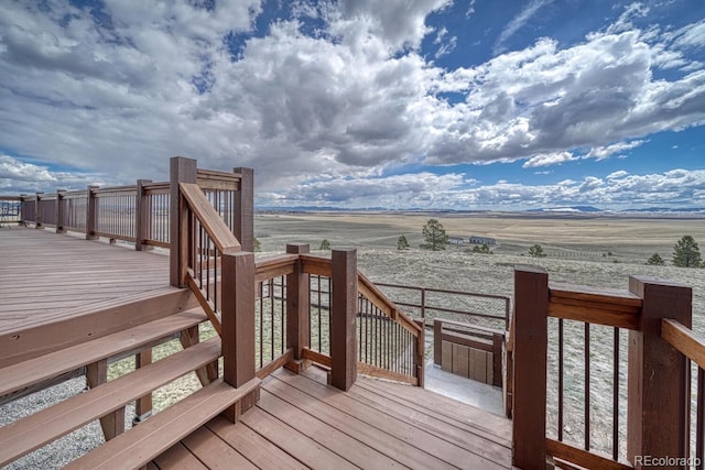 7103 Ranch Rd, Hartsel, CO 80449 - deck featuring a rural view and stairs