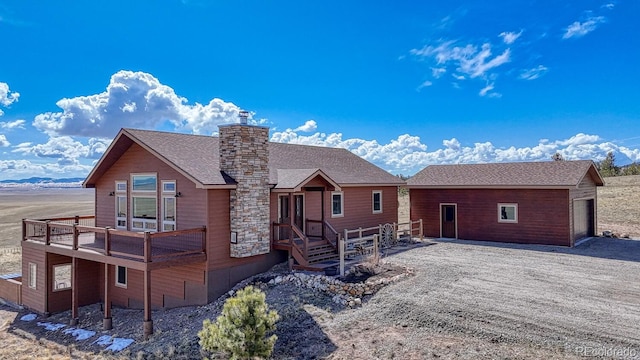 7103 Ranch Rd, Hartsel, CO 80449 - back of house with a chimney and roof with shingles