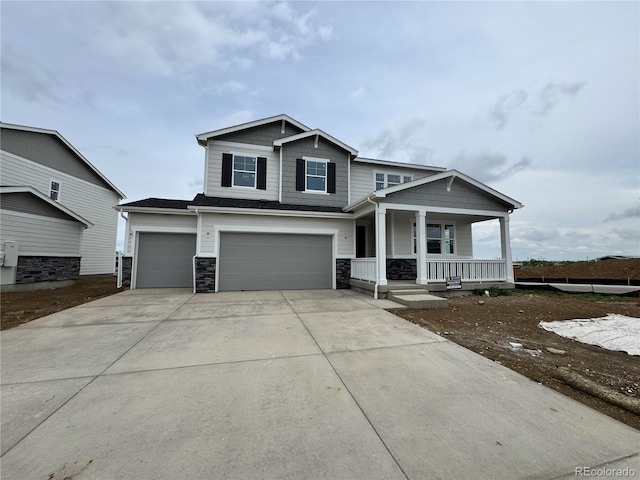 6191 Amerifax Dr, Windsor, CO 80528 - craftsman inspired home with covered porch, stone siding, driveway, and a garage