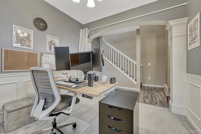 22583 E Union Cir, Aurora, CO 80015 - office with arched walkways, wainscoting, and carpet flooring