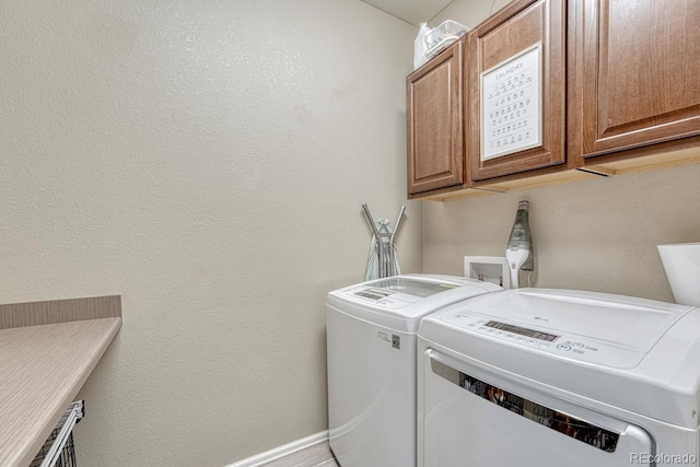 22583 E Union Cir, Aurora, CO 80015 - laundry area featuring cabinet space and washer and dryer