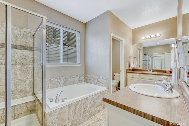 22583 E Union Cir, Aurora, CO 80015 - full bath with a garden tub, vanity, and a stall shower