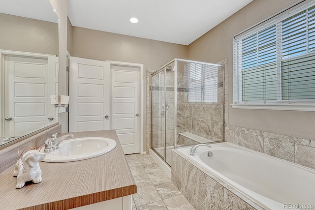 22583 E Union Cir, Aurora, CO 80015 - bathroom featuring a stall shower, a bath, and vanity