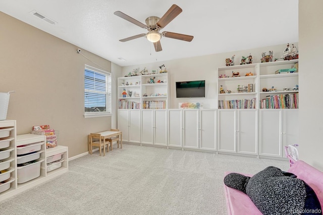 22583 E Union Cir, Aurora, CO 80015 - sitting room with ceiling fan and carpet floors