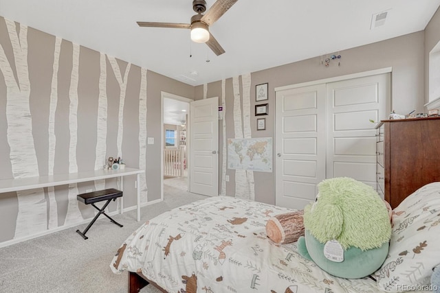 22583 E Union Cir, Aurora, CO 80015 - bedroom with carpet flooring, a closet, and a ceiling fan