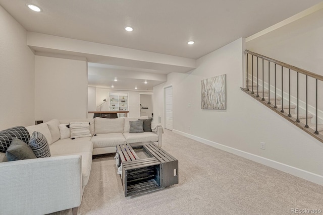 22583 E Union Cir, Aurora, CO 80015 - carpeted living room with recessed lighting and stairway