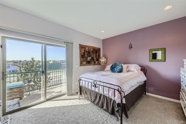 bedroom with light carpet and access to outside