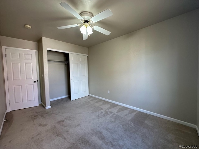 unfurnished bedroom with ceiling fan, a closet, and light colored carpet