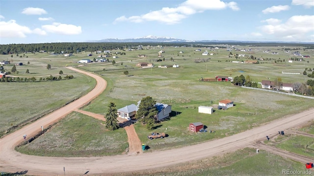 overview of rural landscape featuring a mountain backdrop