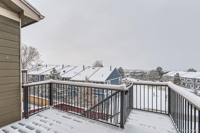 view of snow covered deck