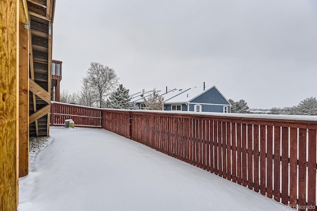 view of snow covered patio