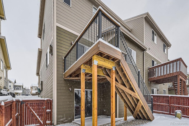 view of snow covered house