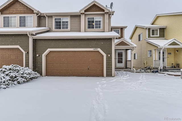 view of front of property with a garage