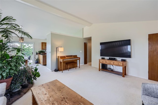 living room featuring vaulted ceiling with beams and light carpet