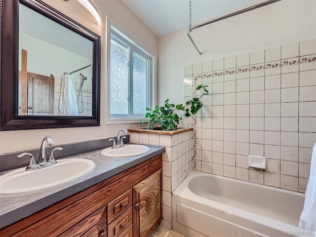 bathroom with vanity and shower / bath combo with shower curtain