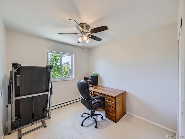 office area with a baseboard radiator, light colored carpet, and ceiling fan