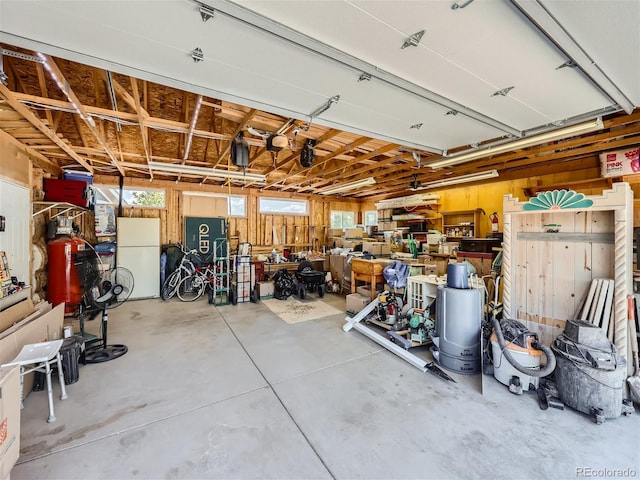 garage with white fridge