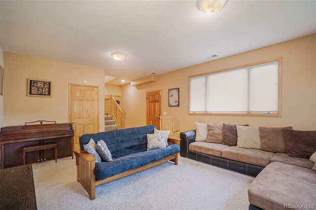 31755 Ponderosa Way, Evergreen, CO 80439 - living area featuring light colored carpet and stairway