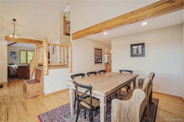 31755 Ponderosa Way, Evergreen, CO 80439 - dining space with light wood-style floors, recessed lighting, and beamed ceiling