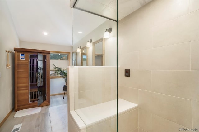 31755 Ponderosa Way, Evergreen, CO 80439 - full bath featuring wood finished floors, walk in shower, and recessed lighting