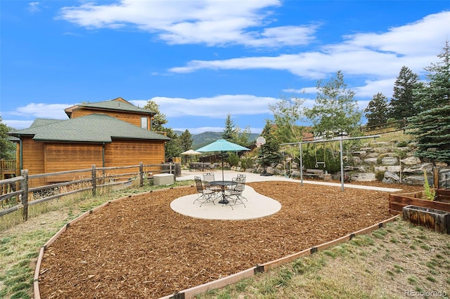 31755 Ponderosa Way, Evergreen, CO 80439 - view of yard featuring a patio
