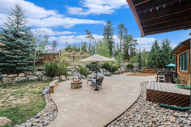 31755 Ponderosa Way, Evergreen, CO 80439 - view of patio featuring a fire pit