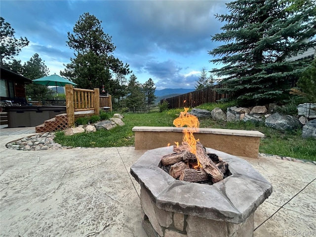 31755 Ponderosa Way, Evergreen, CO 80439 - view of patio featuring an outdoor fire pit