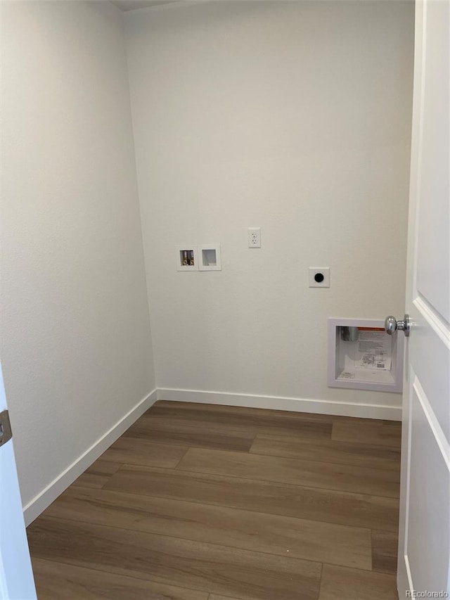 21996 E 39th Pl, Aurora, CO 80019 - washroom featuring hookup for an electric dryer, washer hookup, wood finished floors, and baseboards