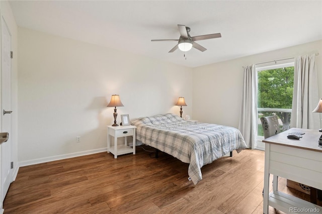 7305 S Xenia Cir Unit E, Centennial, CO 80112 - bedroom featuring wood finished floors and a ceiling fan