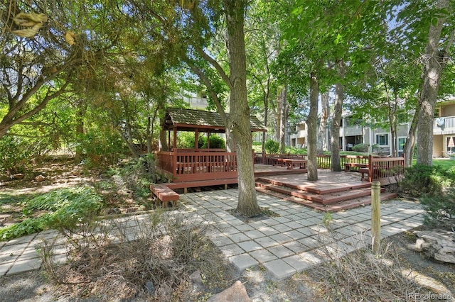 7305 S Xenia Cir Unit E, Centennial, CO 80112 - view of patio featuring a deck