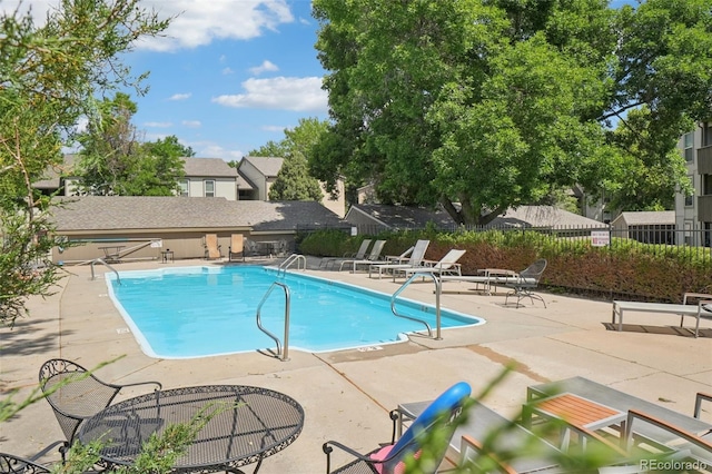 7305 S Xenia Cir Unit E, Centennial, CO 80112 - community pool featuring a patio