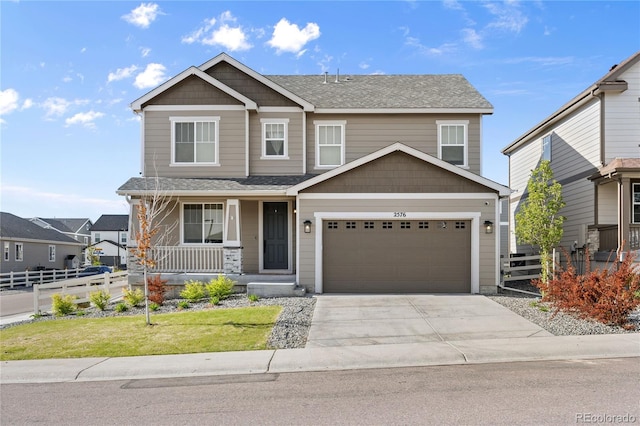 2576 Villageview Ln, Castle Rock, CO 80104 - craftsman-style house featuring covered porch, driveway, a garage, and roof with shingles