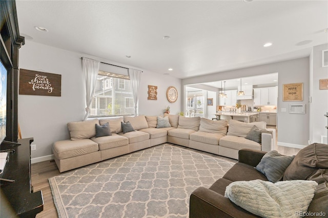 2576 Villageview Ln, Castle Rock, CO 80104 - living room with light wood-style floors, baseboards, and recessed lighting