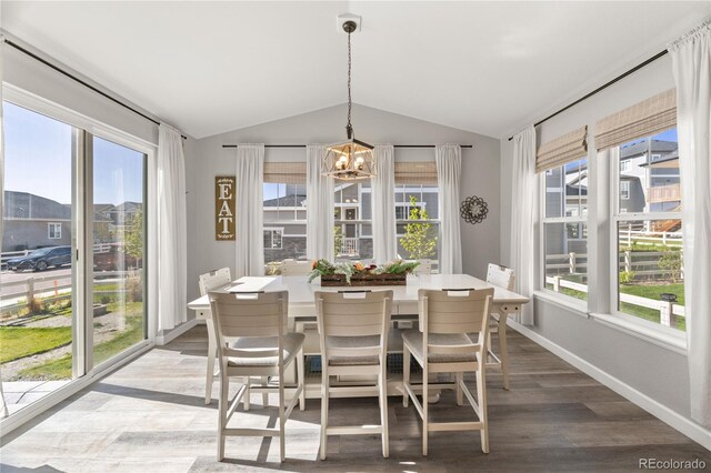 2576 Villageview Ln, Castle Rock, CO 80104 - sunroom featuring vaulted ceiling and a chandelier