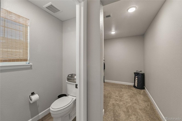 2576 Villageview Ln, Castle Rock, CO 80104 - bathroom with toilet, baseboards, and recessed lighting