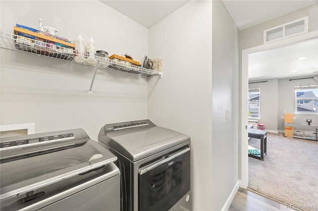 2576 Villageview Ln, Castle Rock, CO 80104 - laundry area featuring washer and dryer, baseboards, and carpet floors