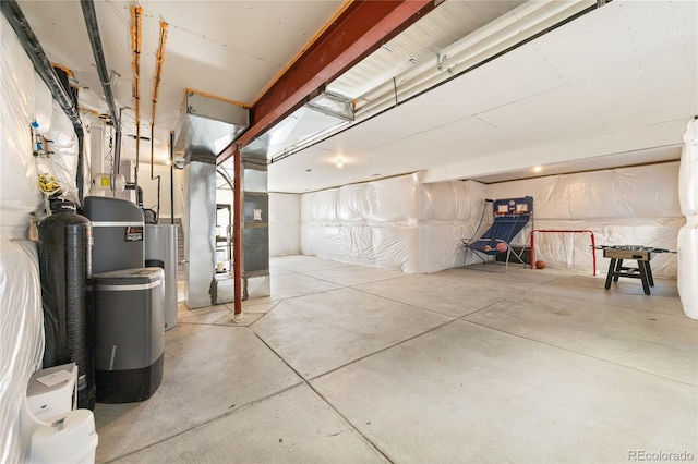2576 Villageview Ln, Castle Rock, CO 80104 - unfinished below grade area featuring a water softener, water heater, and heating unit