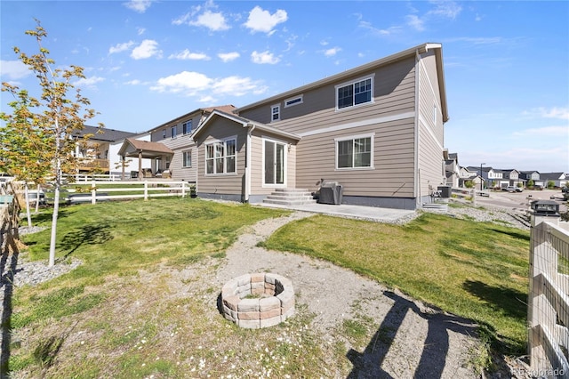 2576 Villageview Ln, Castle Rock, CO 80104 - back of property featuring an outdoor fire pit, a patio area, and entry steps