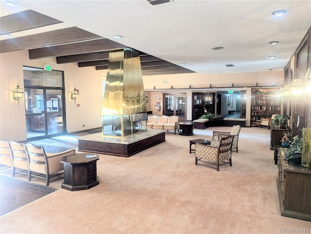 8060 E Girard Ave Unit 910, Denver, CO 80231 - lobby featuring a textured ceiling and beamed ceiling