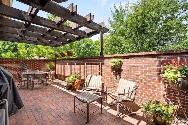 2800 S University Blvd Unit 19, Denver, CO 80210 - view of patio featuring a pergola and outdoor dining area