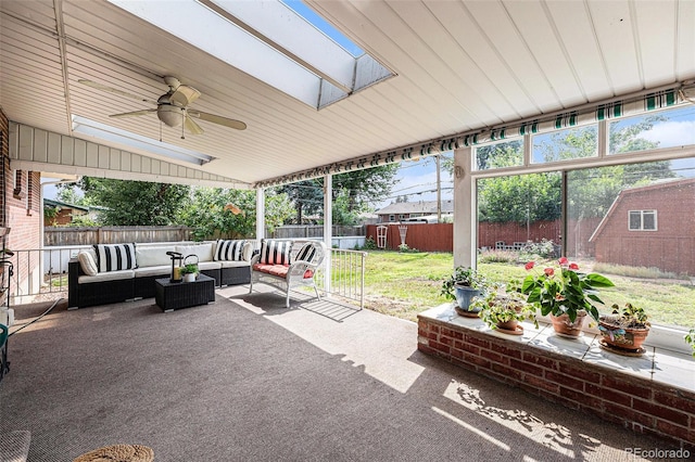 2939 S Zurich Ct, Denver, CO 80236 - sunroom featuring an outdoor hangout area, ceiling fan, and a skylight