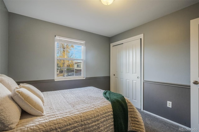 carpeted bedroom with a closet