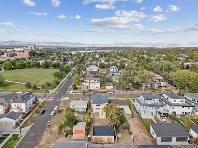 birds eye view of property featuring a mountain view