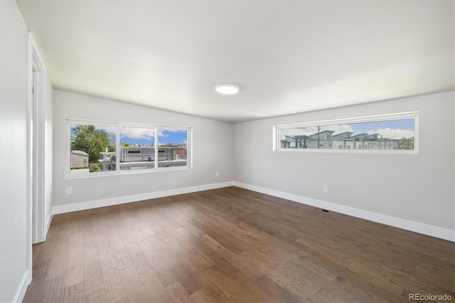 2010 Irving St, Denver, CO 80211 - unfurnished room with dark wood-style flooring and baseboards