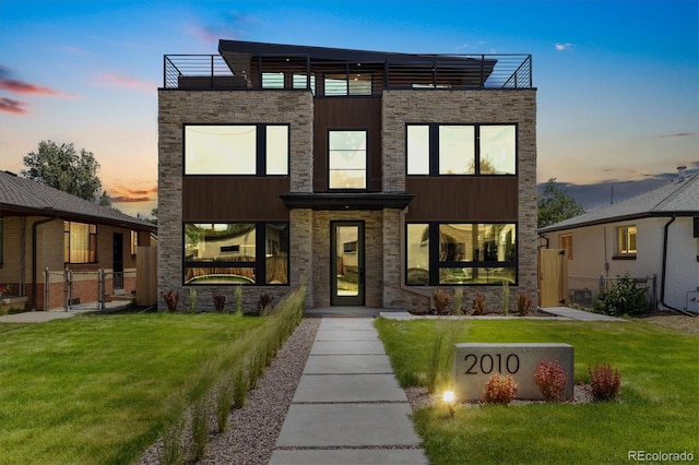2010 Irving St, Denver, CO 80211 - view of front of house featuring stone siding and a gate