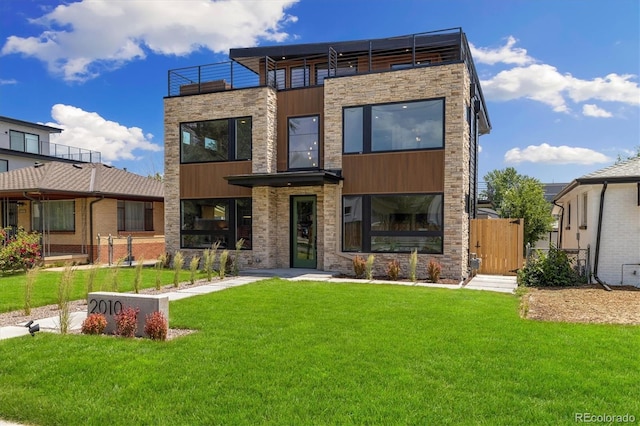 2010 Irving St, Denver, CO 80211 - view of front of house featuring a front yard and stone siding