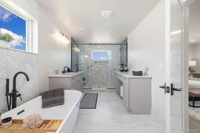 2010 Irving St, Denver, CO 80211 - full bathroom with a tile shower, a freestanding bath, vanity, and ensuite bathroom