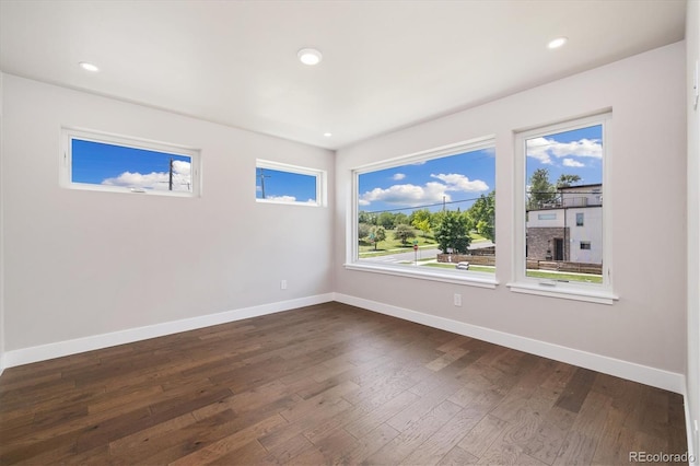2010 Irving St, Denver, CO 80211 - unfurnished room with dark wood-type flooring and recessed lighting